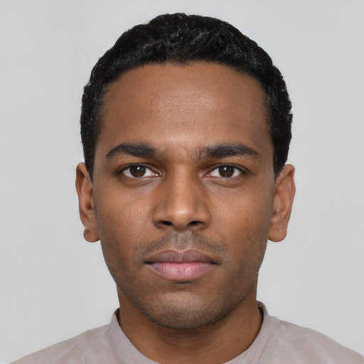 Neutral black young-adult male with short  black hair and brown eyes