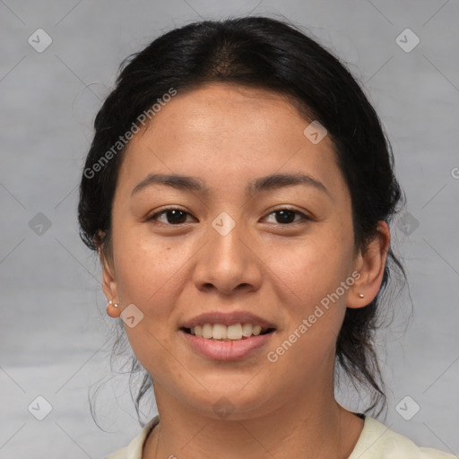 Joyful asian young-adult female with medium  brown hair and brown eyes