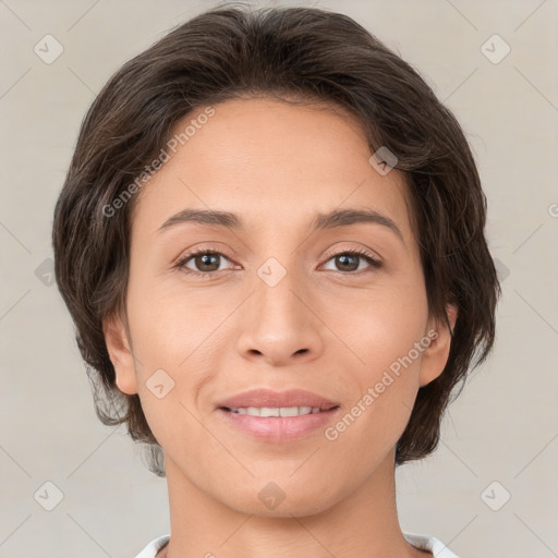 Joyful white young-adult female with medium  brown hair and brown eyes