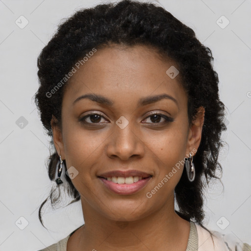 Joyful black young-adult female with long  brown hair and brown eyes