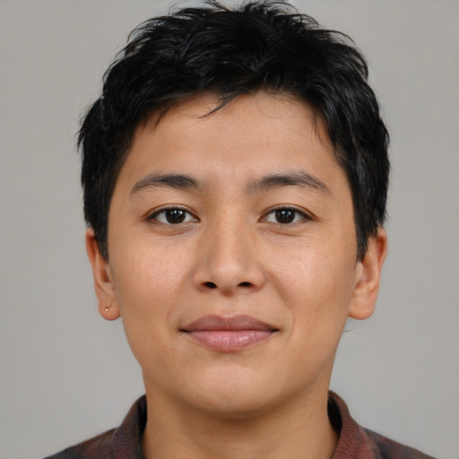 Joyful asian young-adult male with short  brown hair and brown eyes