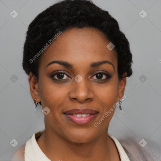 Joyful black young-adult female with short  black hair and brown eyes