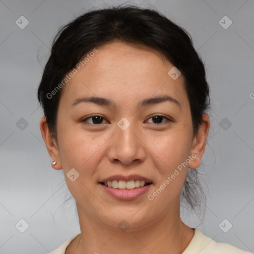 Joyful asian young-adult female with medium  brown hair and brown eyes