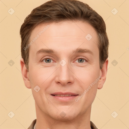 Joyful white adult male with short  brown hair and grey eyes