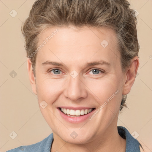 Joyful white adult female with short  brown hair and grey eyes