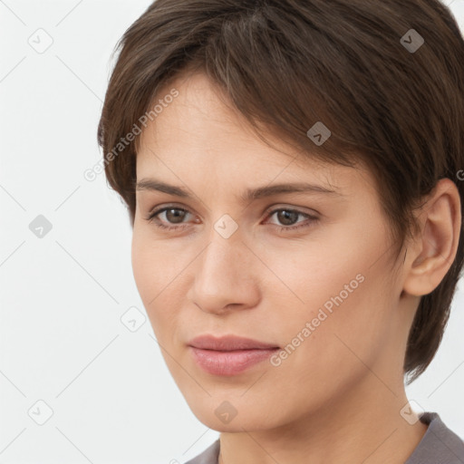 Neutral white young-adult female with short  brown hair and brown eyes