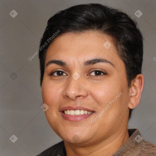 Joyful white adult female with short  brown hair and brown eyes