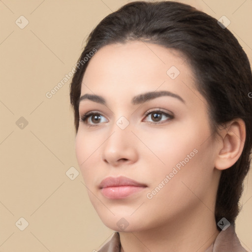 Neutral white young-adult female with long  brown hair and brown eyes