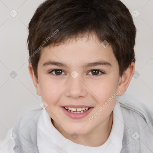 Joyful white child male with short  brown hair and brown eyes