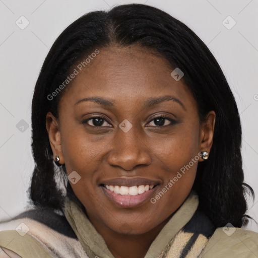 Joyful black young-adult female with medium  brown hair and brown eyes