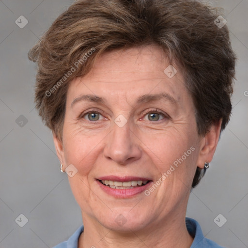 Joyful white adult female with short  brown hair and brown eyes