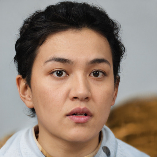 Neutral white young-adult female with short  brown hair and brown eyes