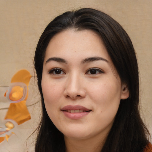 Joyful asian young-adult female with long  brown hair and brown eyes