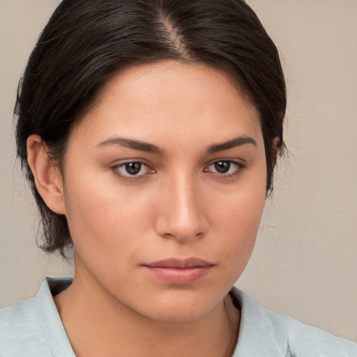 Neutral white young-adult female with medium  brown hair and brown eyes