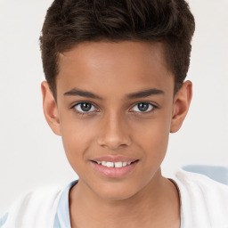 Joyful white child female with short  brown hair and brown eyes