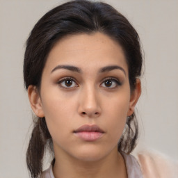 Neutral asian young-adult female with medium  brown hair and brown eyes