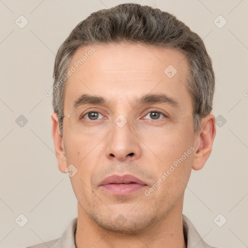 Neutral white adult male with short  brown hair and brown eyes