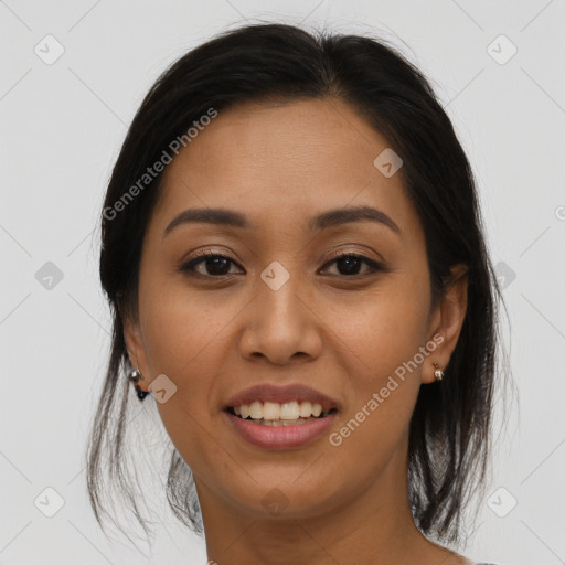 Joyful asian young-adult female with long  brown hair and brown eyes