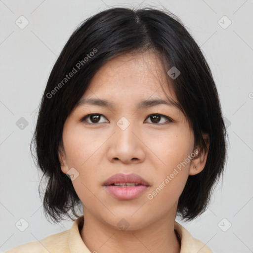 Neutral asian young-adult female with medium  black hair and brown eyes
