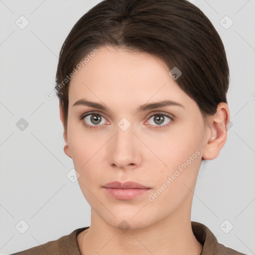 Neutral white young-adult female with short  brown hair and brown eyes