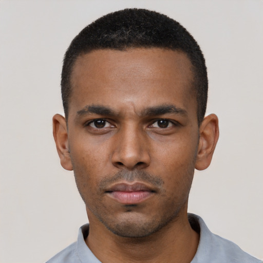 Neutral black young-adult male with short  black hair and brown eyes