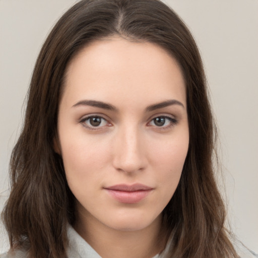 Neutral white young-adult female with long  brown hair and brown eyes