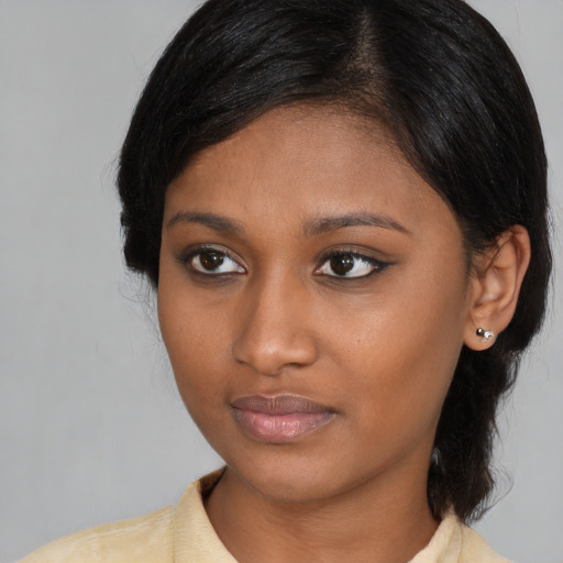 Neutral asian young-adult female with medium  black hair and brown eyes