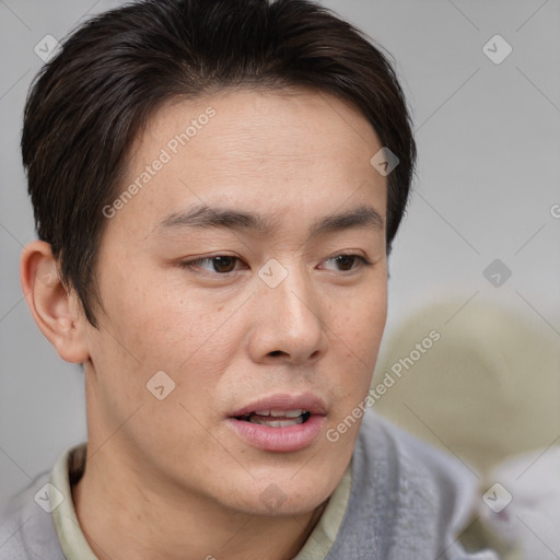 Neutral white young-adult male with short  brown hair and brown eyes