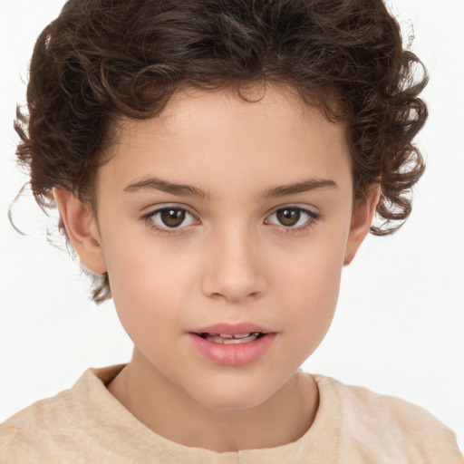 Joyful white child female with short  brown hair and brown eyes