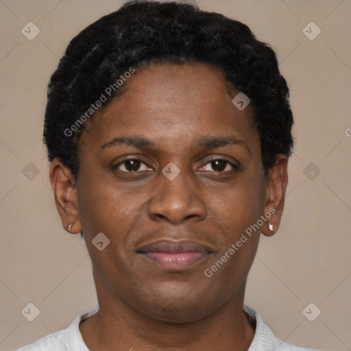 Joyful latino young-adult male with short  brown hair and brown eyes