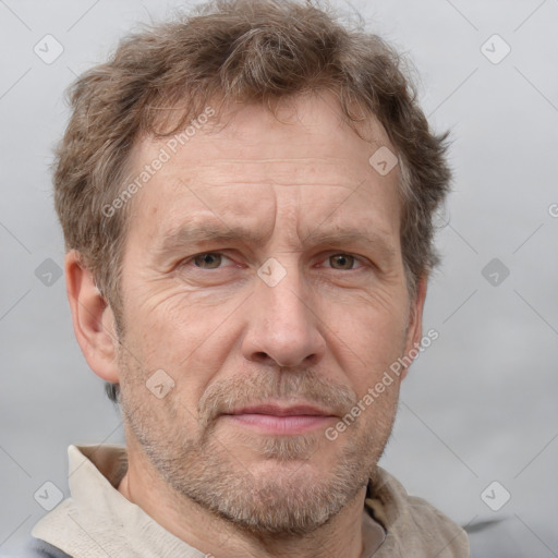 Joyful white middle-aged male with short  brown hair and brown eyes