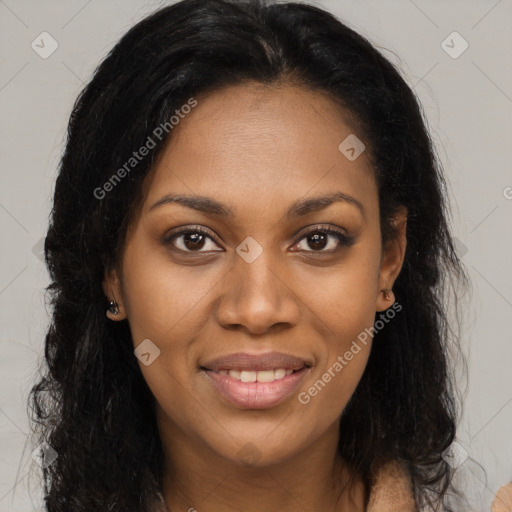 Joyful black young-adult female with long  brown hair and brown eyes