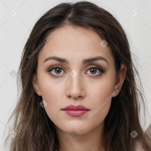 Neutral white young-adult female with long  brown hair and brown eyes