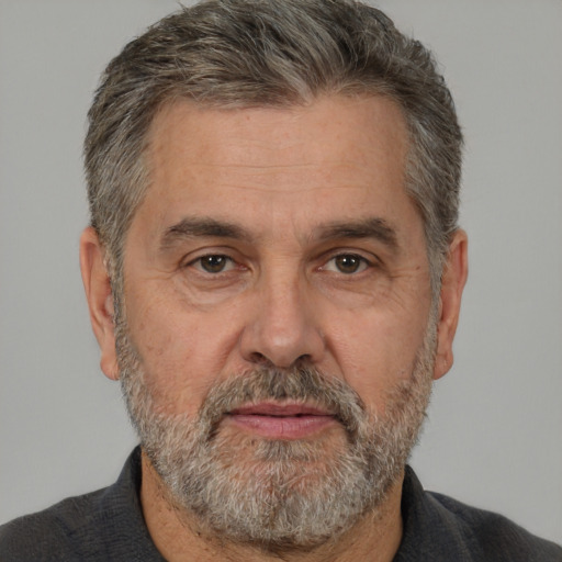 Neutral white middle-aged male with short  gray hair and brown eyes