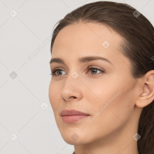 Neutral white young-adult female with short  brown hair and brown eyes