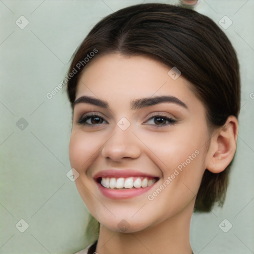 Joyful white young-adult female with medium  brown hair and brown eyes