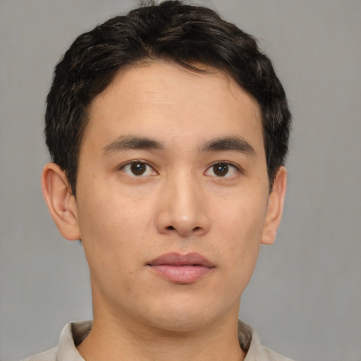 Neutral asian young-adult male with short  brown hair and brown eyes