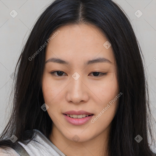 Joyful asian young-adult female with long  brown hair and brown eyes