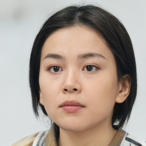 Neutral asian young-adult female with medium  black hair and brown eyes