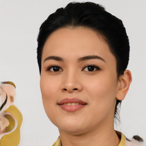 Joyful asian young-adult female with short  black hair and brown eyes