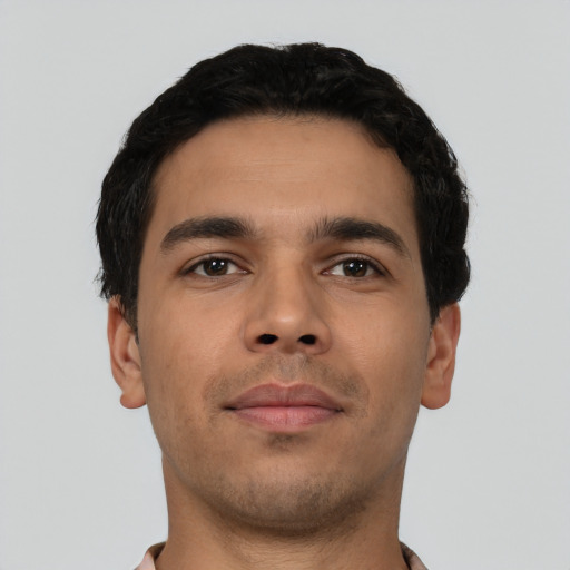 Neutral latino young-adult male with short  black hair and brown eyes