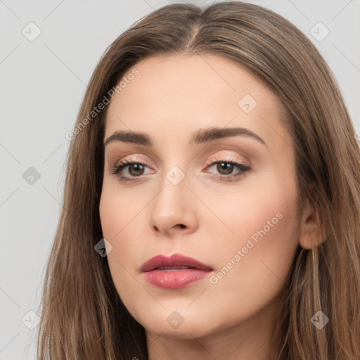 Neutral white young-adult female with long  brown hair and brown eyes