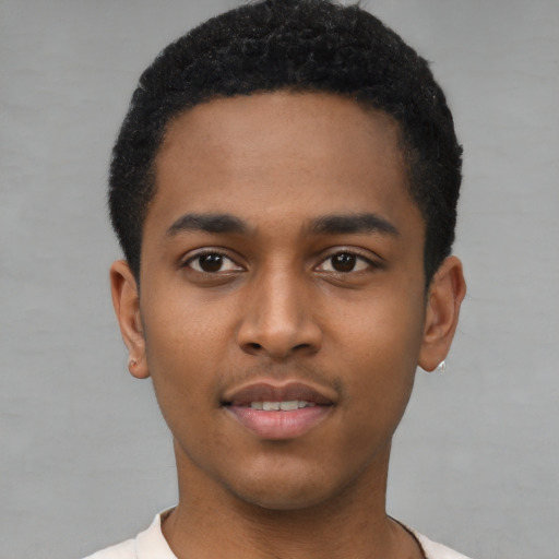 Neutral latino young-adult male with short  brown hair and brown eyes