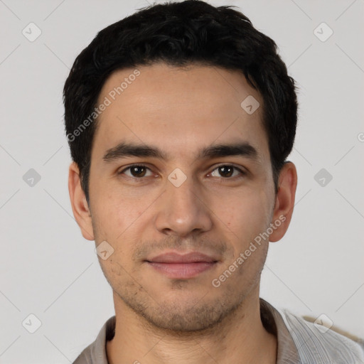 Joyful white young-adult male with short  black hair and brown eyes