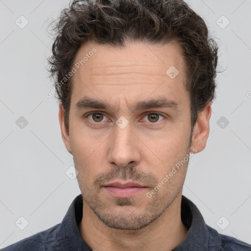 Neutral white adult male with short  brown hair and brown eyes