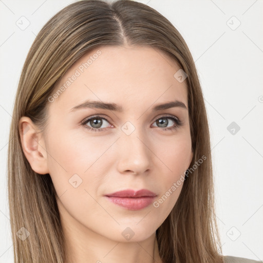 Neutral white young-adult female with long  brown hair and brown eyes