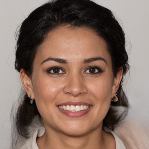 Joyful white young-adult female with medium  brown hair and brown eyes