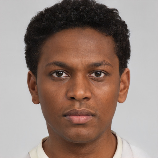Neutral black young-adult male with short  brown hair and brown eyes