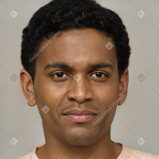 Joyful latino young-adult male with short  brown hair and brown eyes