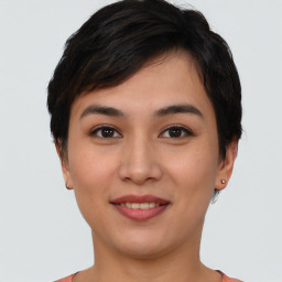 Joyful asian young-adult female with short  brown hair and brown eyes